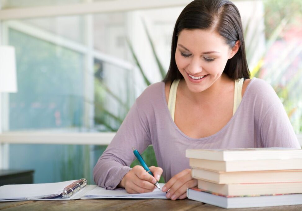 A woman working on her studies.